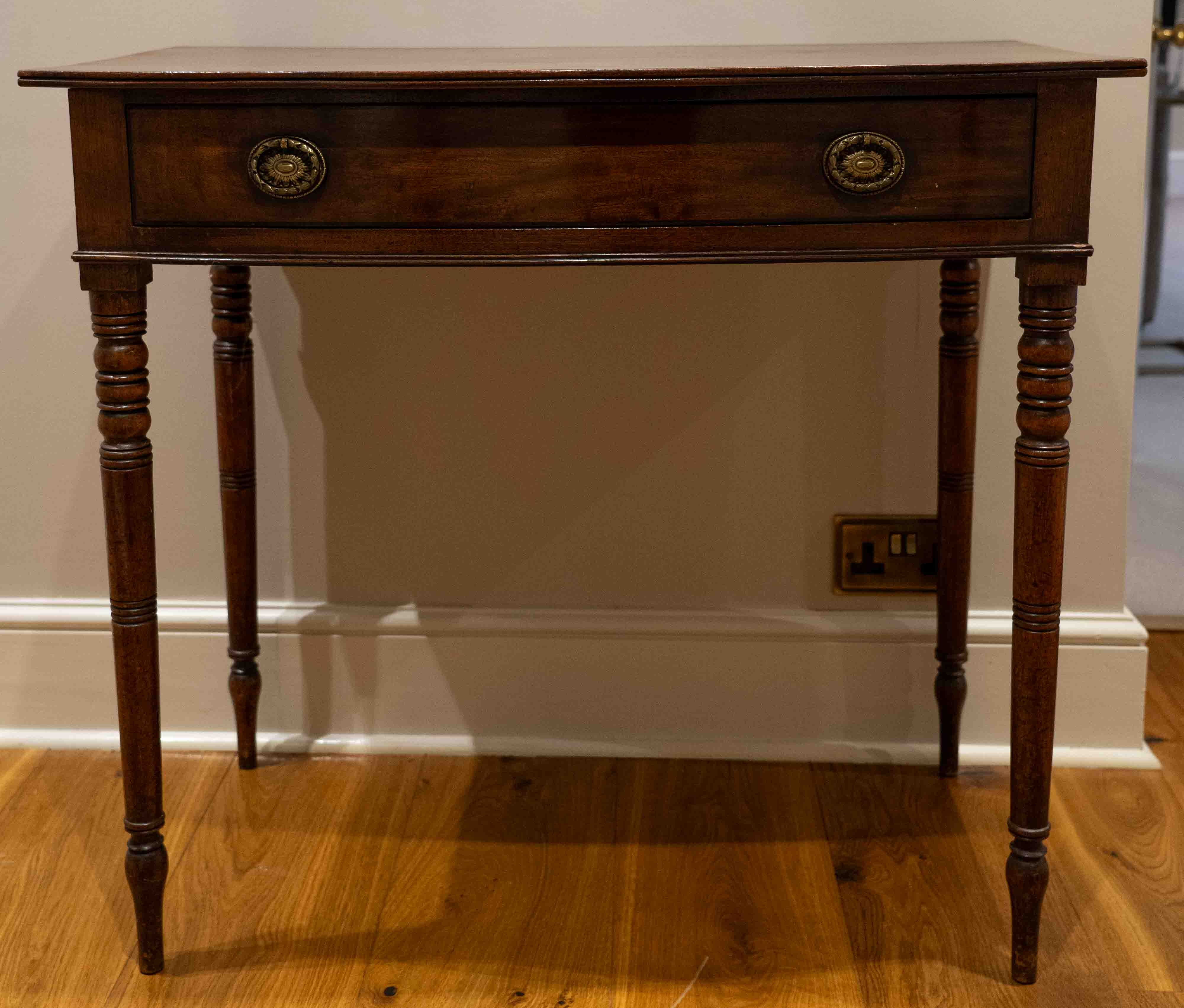 A Regency mahogany bow front side table, width 91cm, depth 53cm, height 81cm. Condition - fair